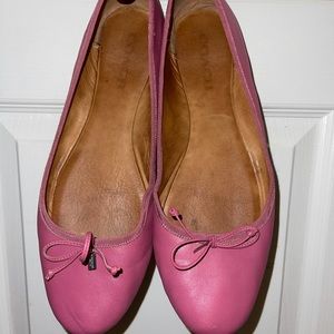 Pink coach flats